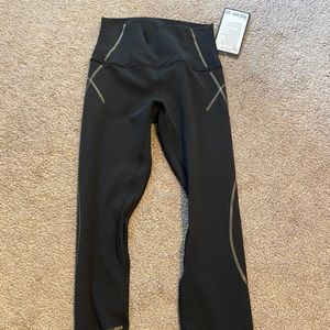 Gold Black Align pants.